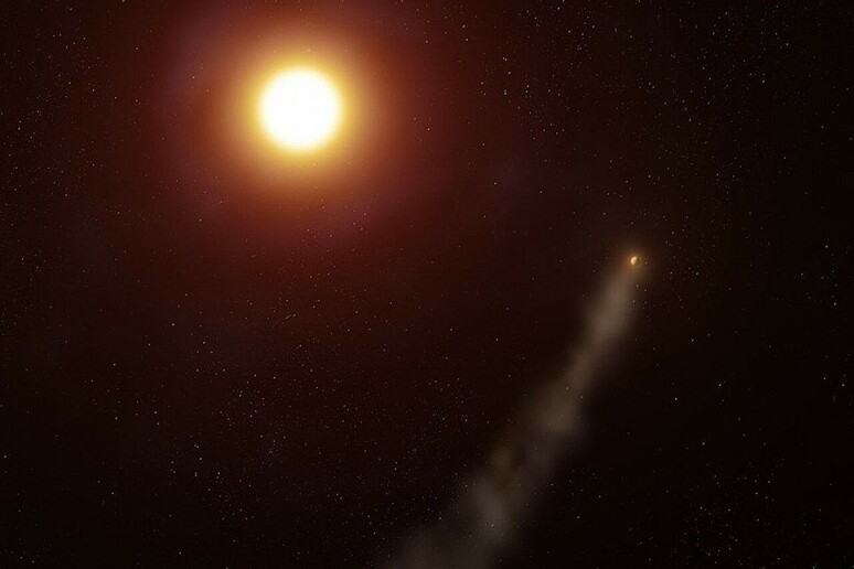 Rappresentazione artistica del pianeta Wasp-69b con la sua coda da cometa (fonte: Adam Makarenko/W. M. Keck Observatory) -     RIPRODUZIONE RISERVATA